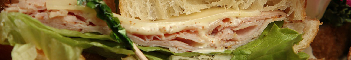 Eating Sandwich Cafe at Mountainside Bakery & Cafe restaurant in Princeton, MA.